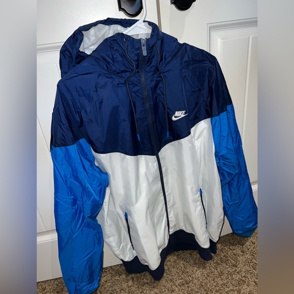 Brand new Nike windbreaker size large color blue/white